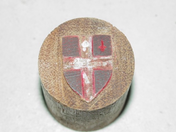 Wooden stamp of the arms of London.