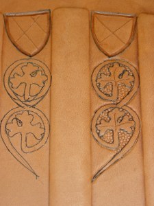 The embossing partially completed. The error on the top left vine leaf was corrected before the outline was cut. The ring decoration was done with a 3mm nail punch.